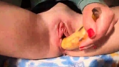 Wet latina cunt opens for a banana