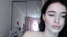 Beautiful teen brunette Jessica Sinn masturbates